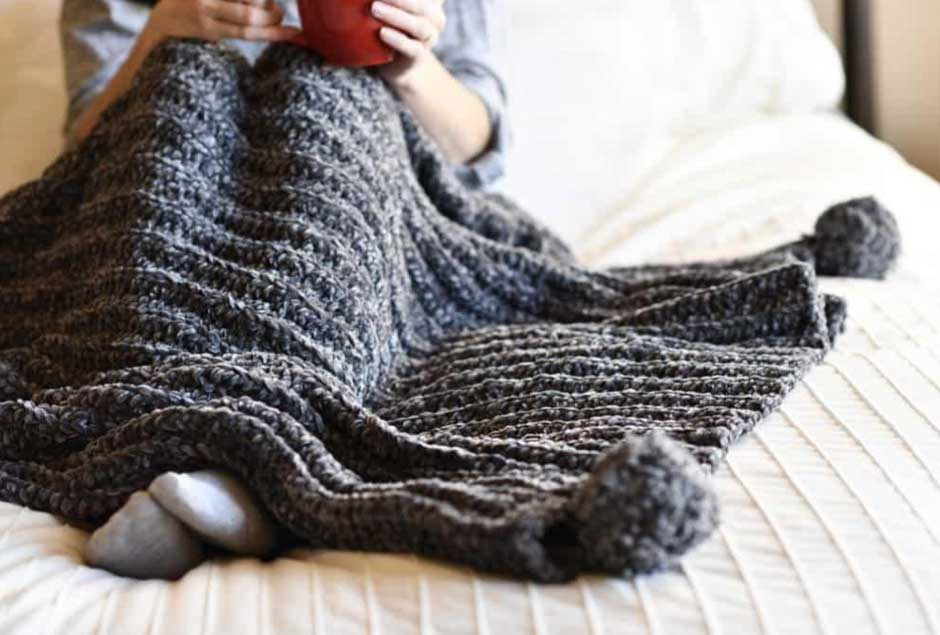 What Are the Benefits of Using a Throw Blanket on Your Bed?
